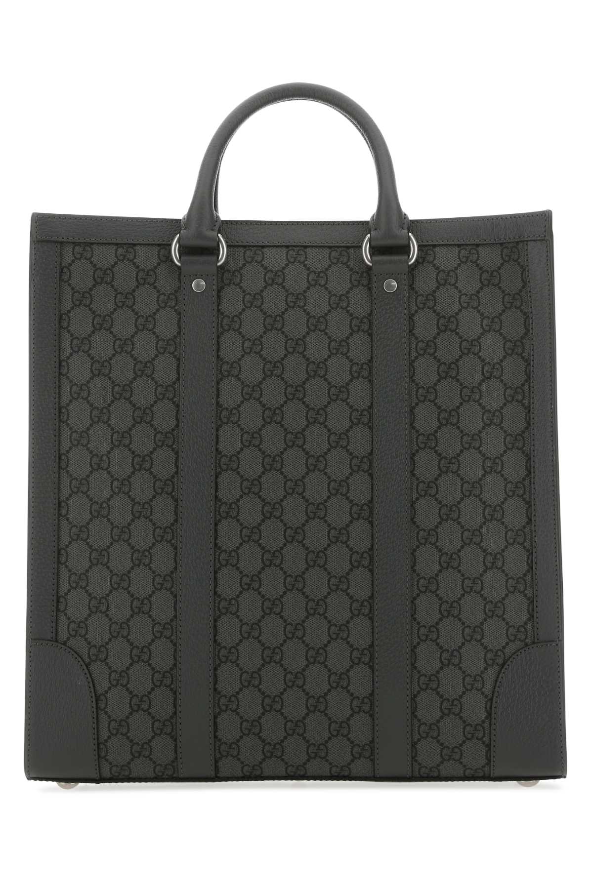 Black patterned tote bag on a white background