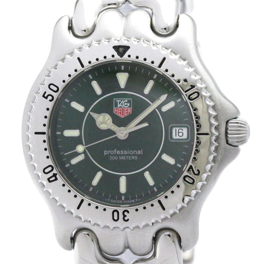 A silver stainless steel wristwatch with a dark green dial, featuring a rotating bezel, date window, and a silver link bracelet, shown against a plain white background.