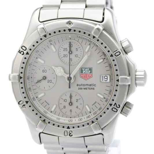 TAG Heuer automatic chronograph watch with a silver stainless steel case and link bracelet, featuring a light gray dial with three subdials and a date window.
