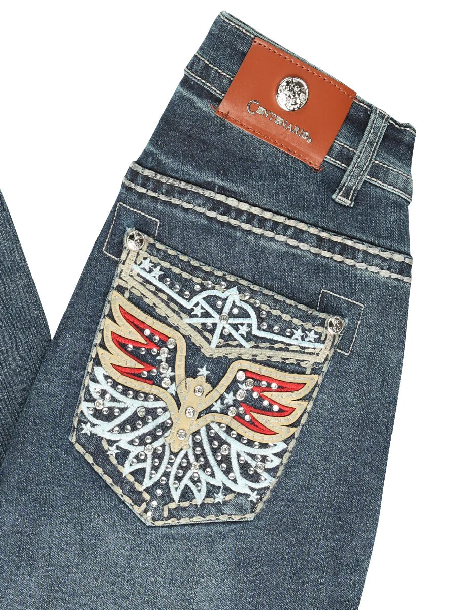 Blue jeans with a decorative pocket featuring an eagle design on a white background