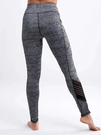 Gray leggings with a black stripe on a white background