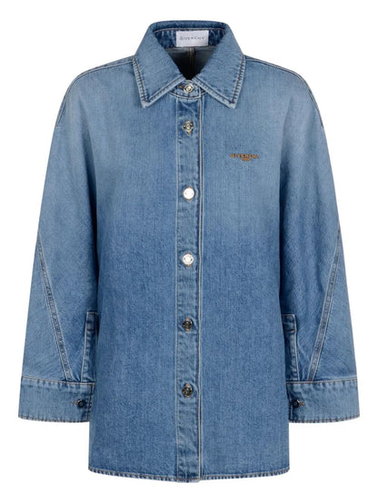 Blue denim jacket on a white background