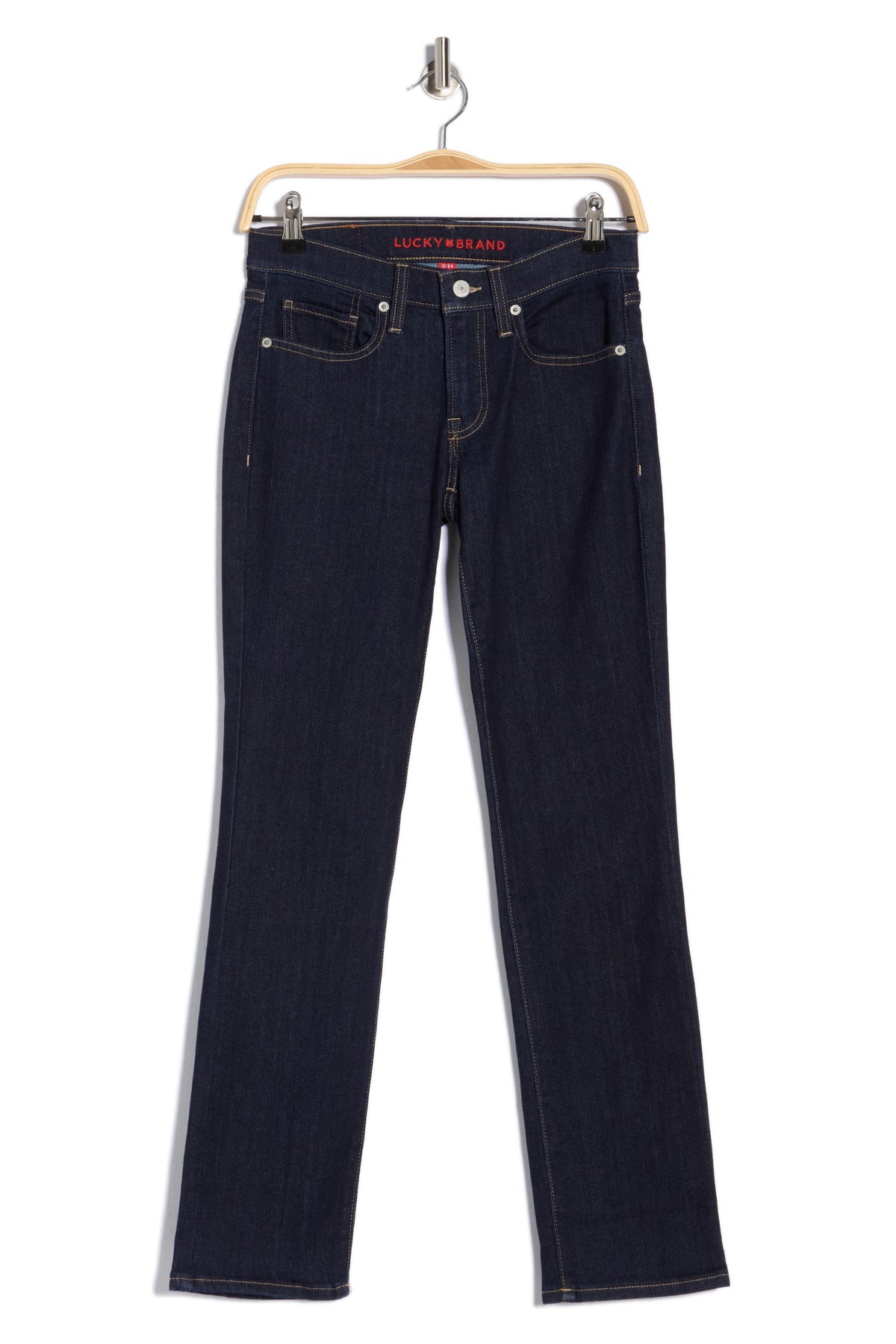 Dark blue jeans on a hanger with 'Lucky Brand' label.