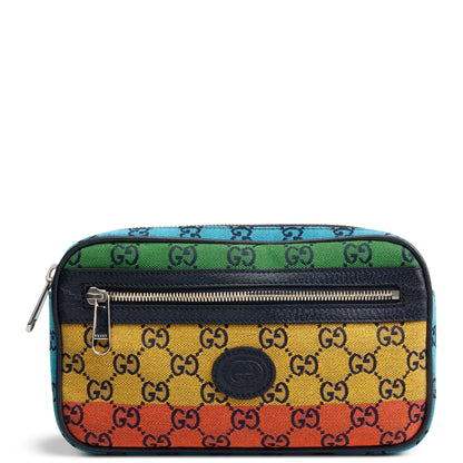 A rectangular Gucci cosmetic pouch featuring a multicolor rainbow stripe design with black GG Supreme monogram canvas. The pouch has a top zipper, a horizontal zippered pocket, and a central oval logo patch, shown against a plain white background.