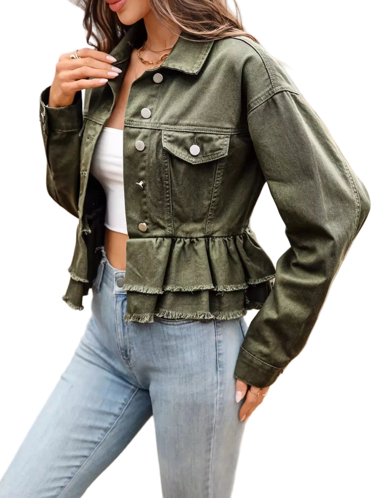 Person wearing an olive green peplum jacket and light blue jeans outdoors.