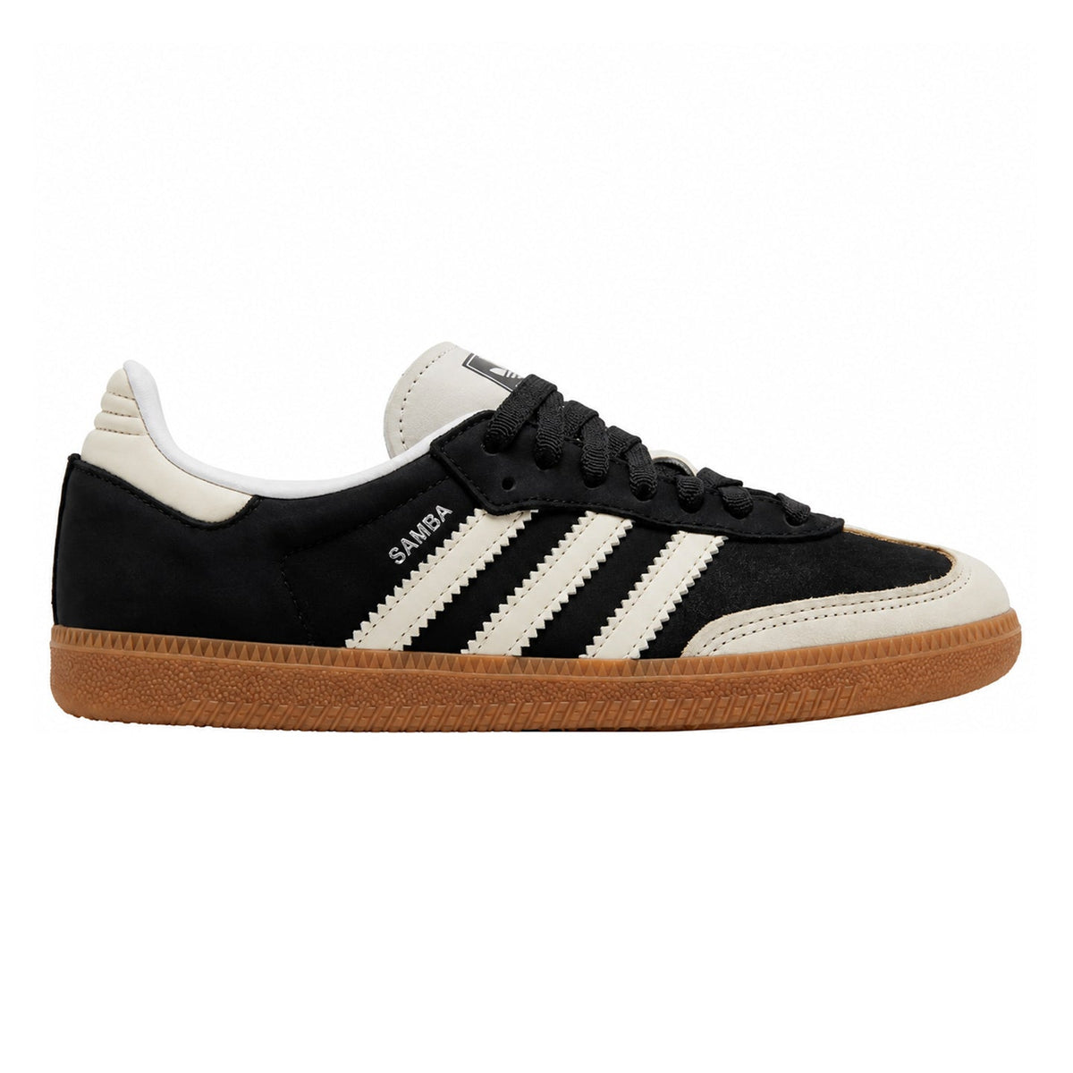 A classic Adidas Samba sneaker in black suede with off-white stripes, a black laces, and a brown gum sole, shown from a side profile on a white background.