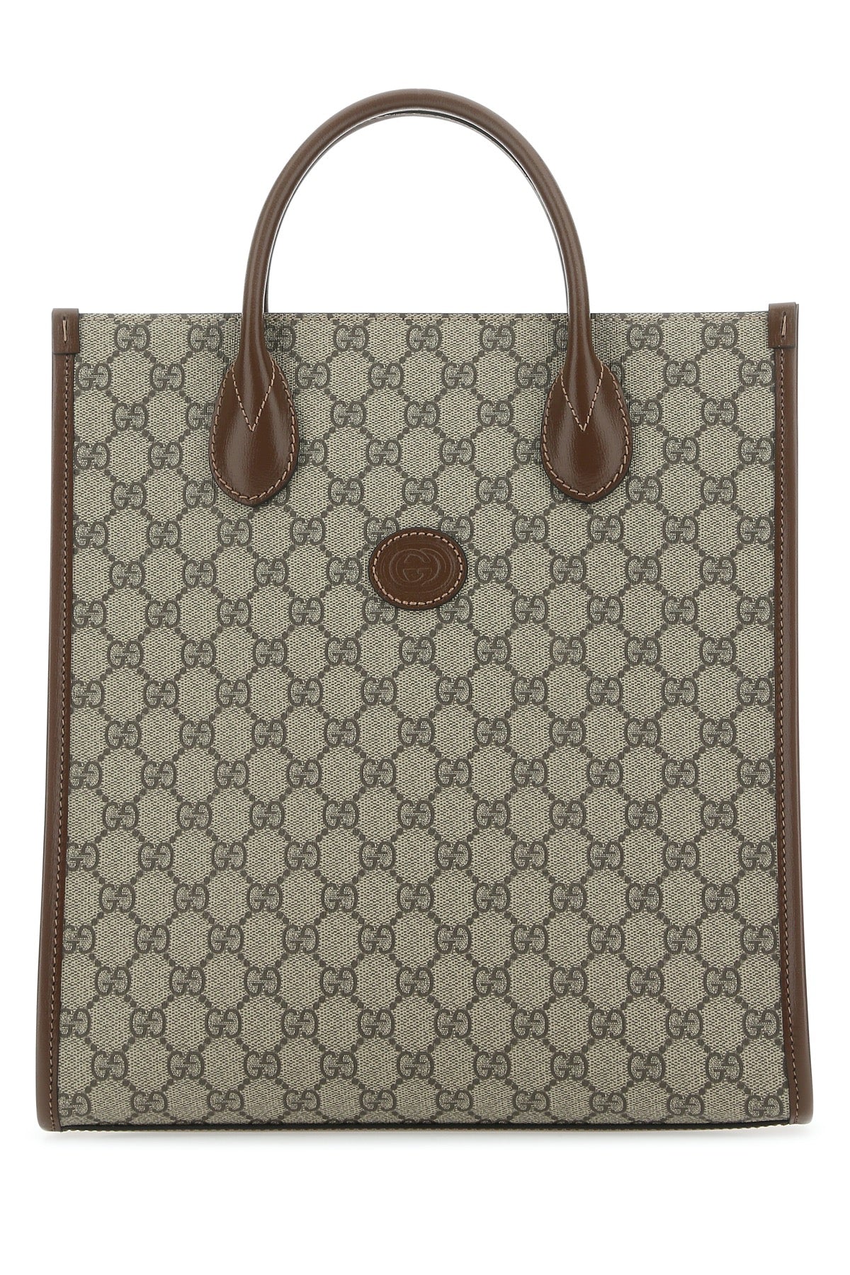 Tote bag with brown handle and patterned body on a white background
