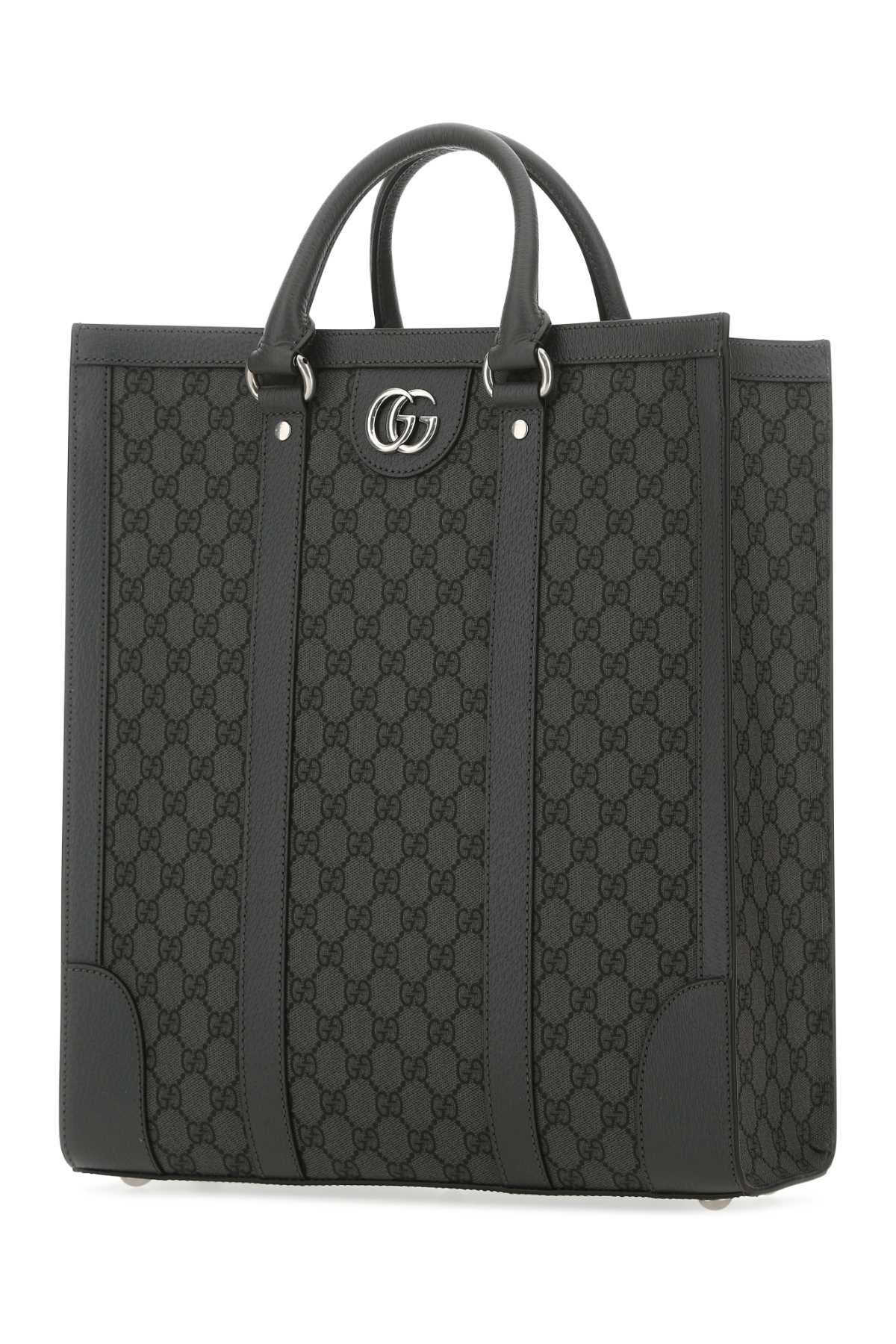 Black Gucci tote bag with iconic pattern on a white background