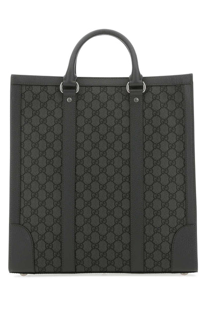 Black patterned tote bag on a white background