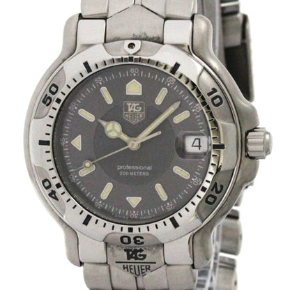 Silver watch with a dark face on a white background