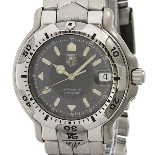 Silver watch with a dark face on a white background