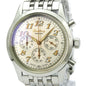 Silver Breitling watch with a detailed face on a white background