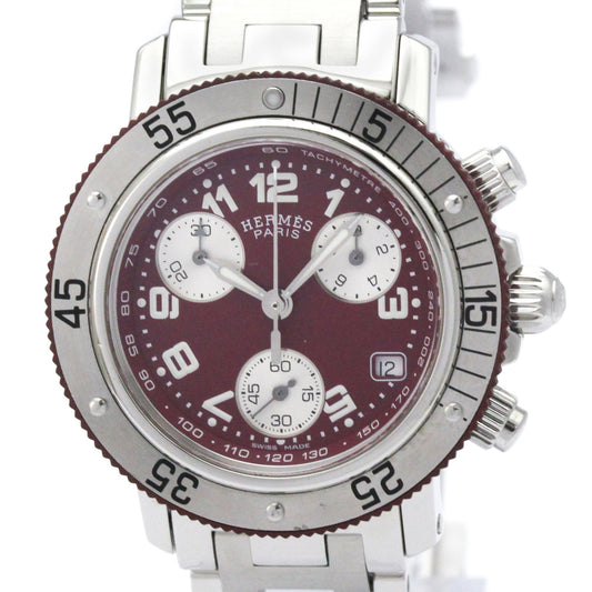Hermes Paris stainless steel chronograph watch with a deep burgundy dial, silver-tone bezel, and white sub-dials.