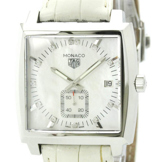 Tag Heuer Monaco watch with white face and leather strap on a white background