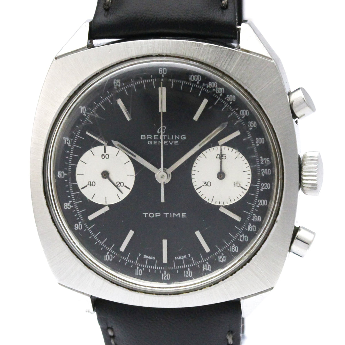 A vintage Breitling chronograph watch with a black dial, silver-tone case, and black leather strap, shown against a plain white background.