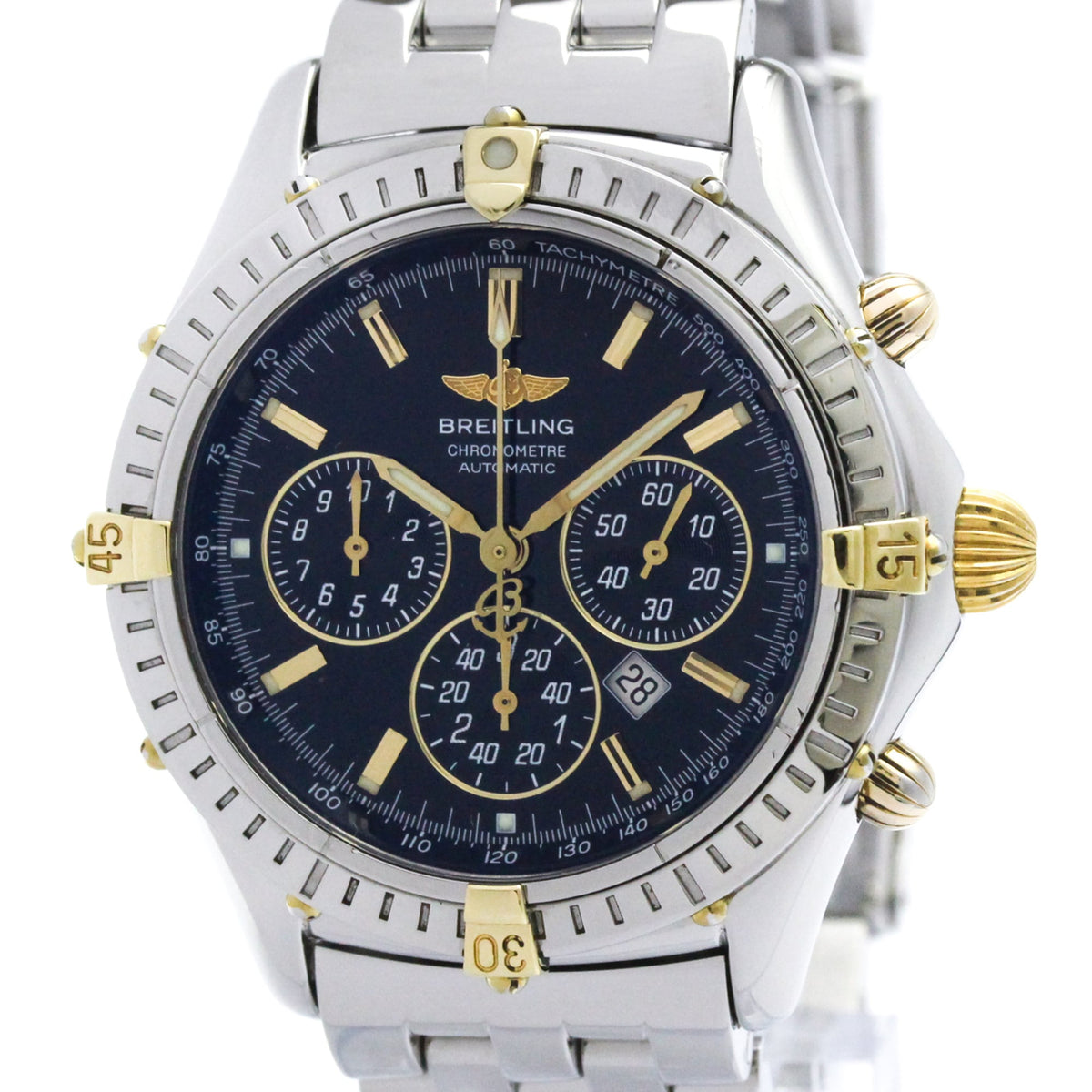 A Breitling Chrono Daytona Automatic watch with a silver stainless steel bracelet, a dark blue dial, and gold-tone accents, shown on a white background.