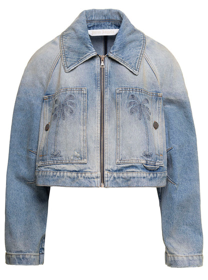 Light blue denim jacket with palm tree designs on a white background
