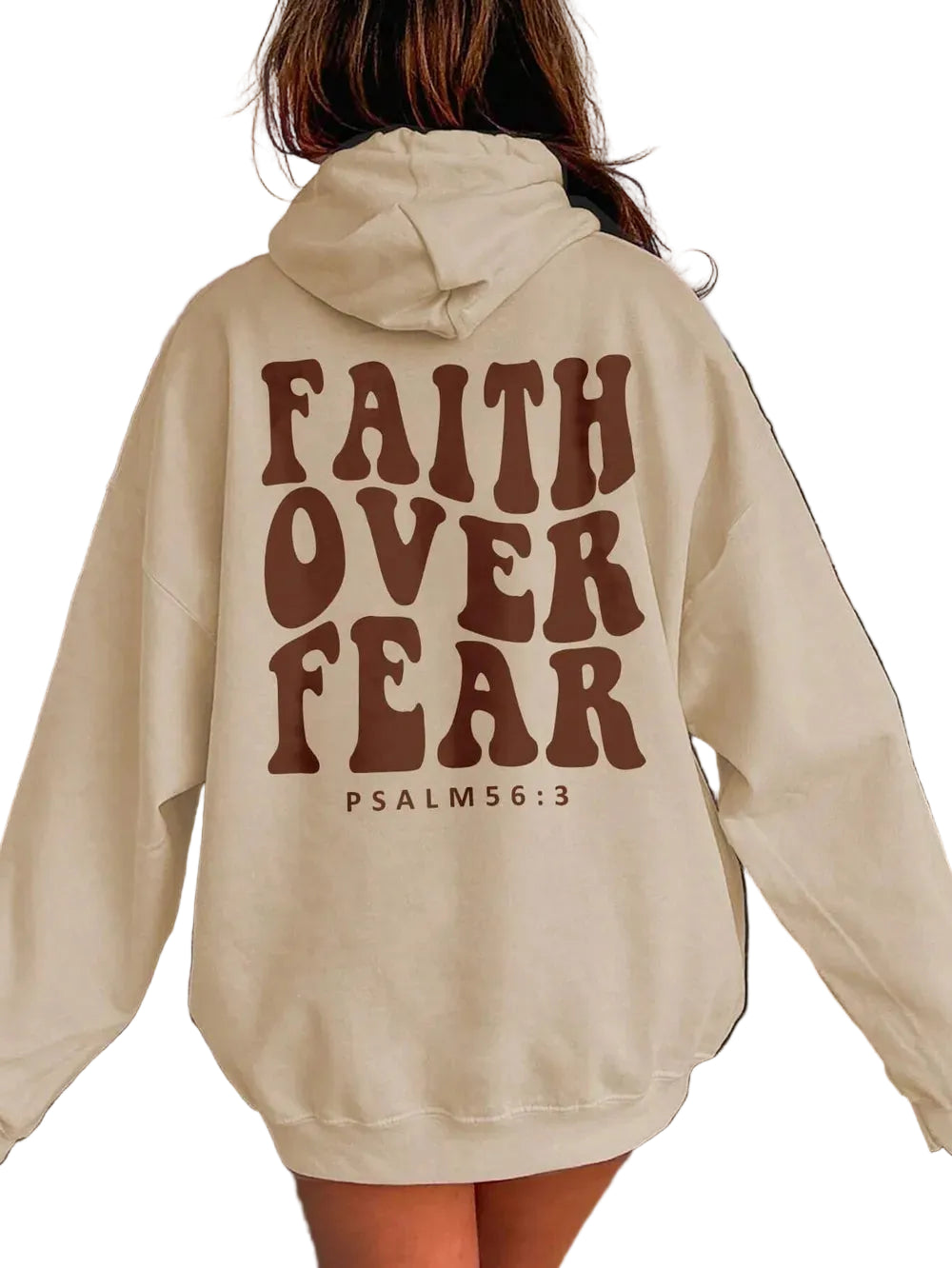 Person wearing a beige hoodie with 'Faith Over Fear' text at sunset