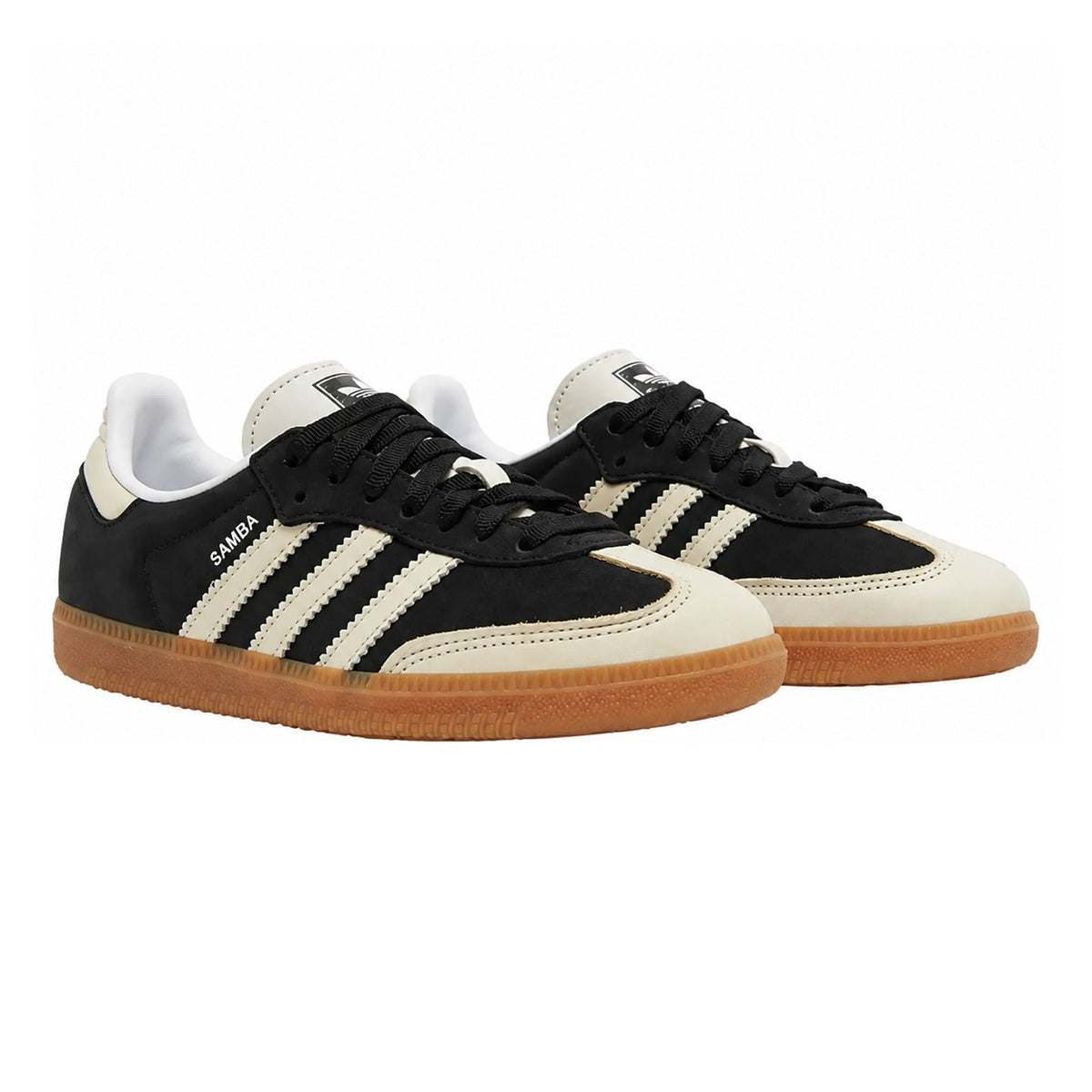 A pair of Adidas Samba sneakers in black and off-white with a brown gum sole, shown on a clean white background.
