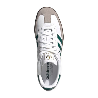 A top-down view of an Adidas Samba sneaker in white, taupe, and green, featuring white leather panels, a taupe suede toe cap, and green stripes on a white background.