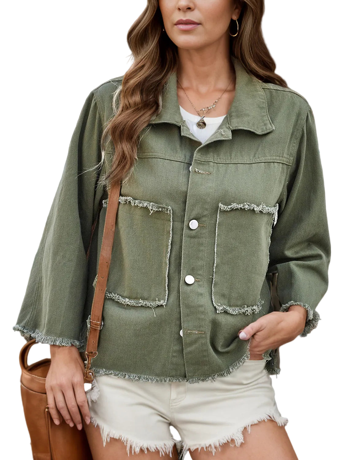 Woman wearing an olive green jacket with a blurred background