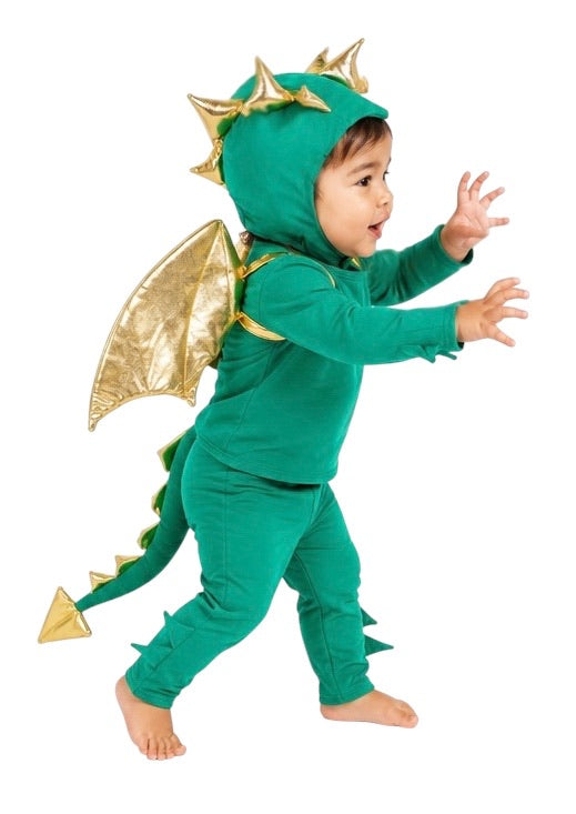 Child wearing a green dragon costume with gold accents on a white background