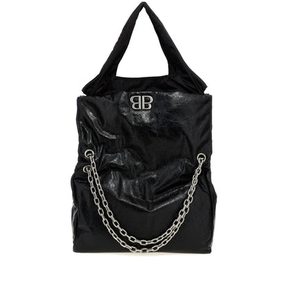 Black handbag with chain detail and logo on a white background