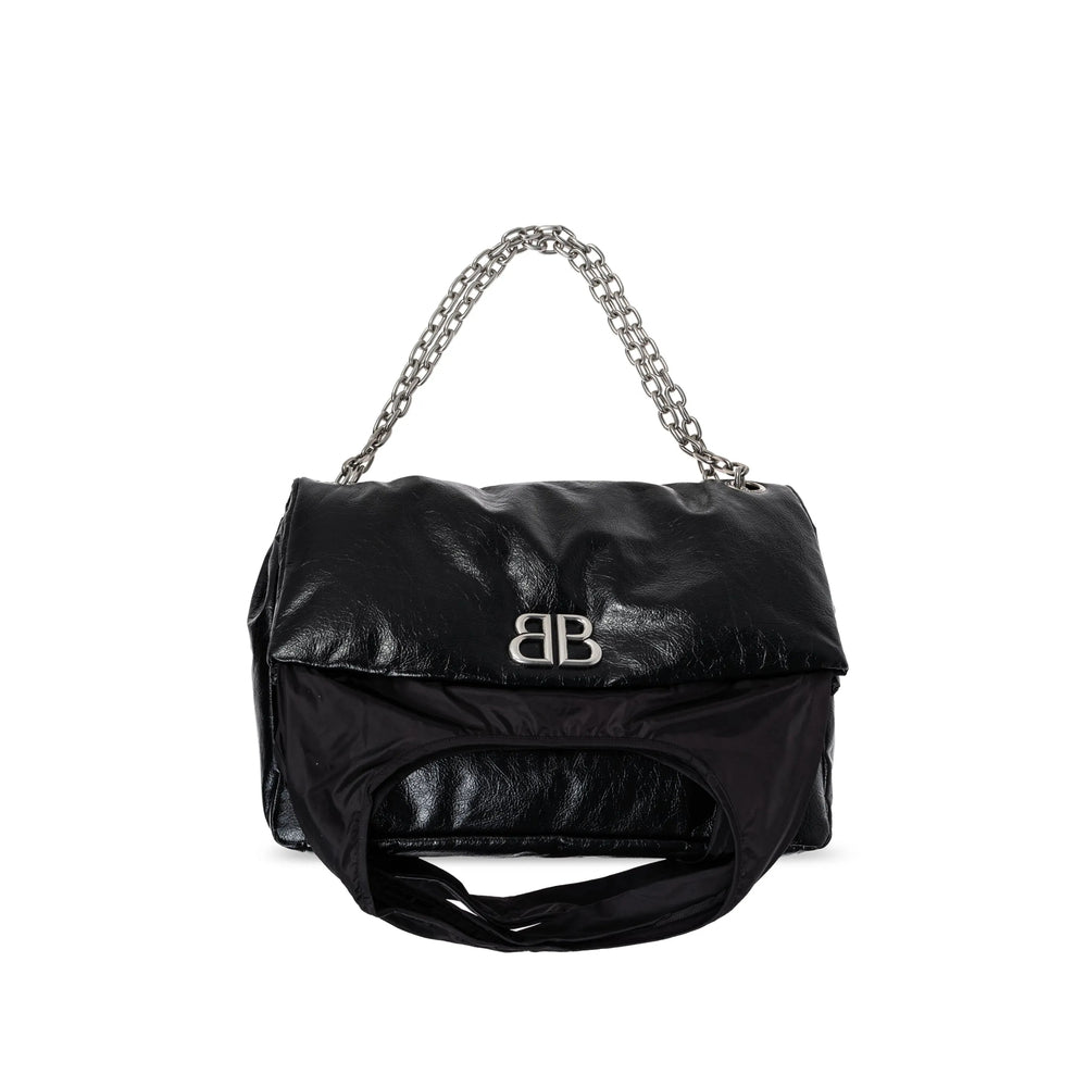 Black handbag with chain handle on a white background