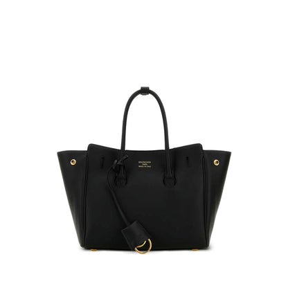 A black leather tote bag with gold-tone hardware, featuring dual top handles, a detachable shoulder strap, and gold lettering on the front that reads 'BALENCIAGA PARIS'.