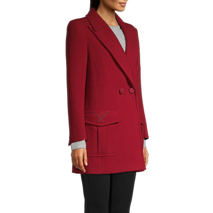 Red coat worn by a person on a white background