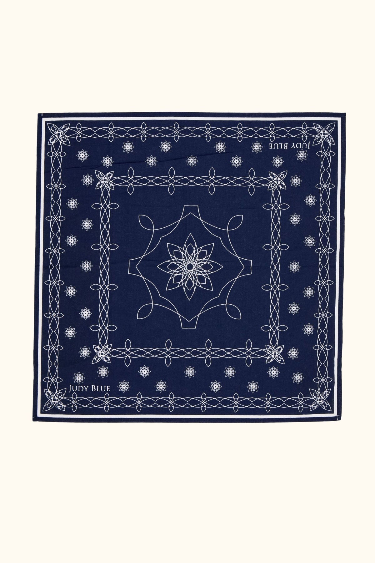 Navy blue bandana with white patterns and text on a white background