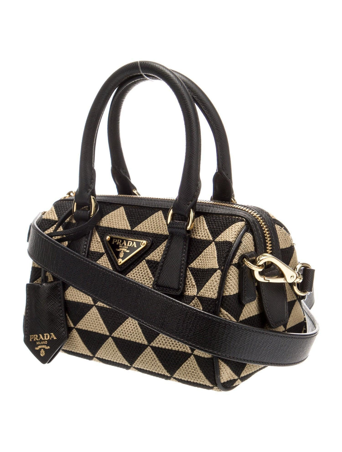 Prada handbag with black and beige geometric pattern on a white background