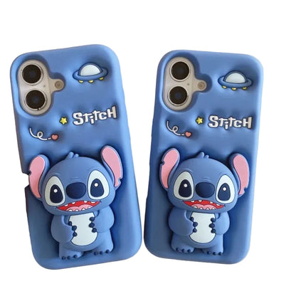 Two blue phone cases featuring a 3D Stitch character design, shown on a light beige surface with one case being held by a hand.