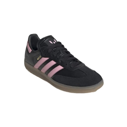 Black Adidas sneaker with pink stripes on a white background