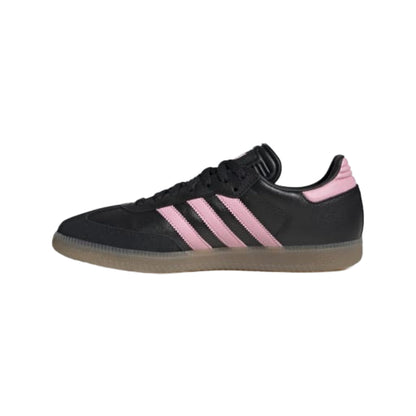 Black Adidas sneaker with pink stripes on a white background