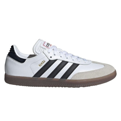 A white Adidas Samba sneaker with black three-stripes, a black heel tab, gold 'SAMBA' text, and a brown gum sole, shown in a side profile on a white background.