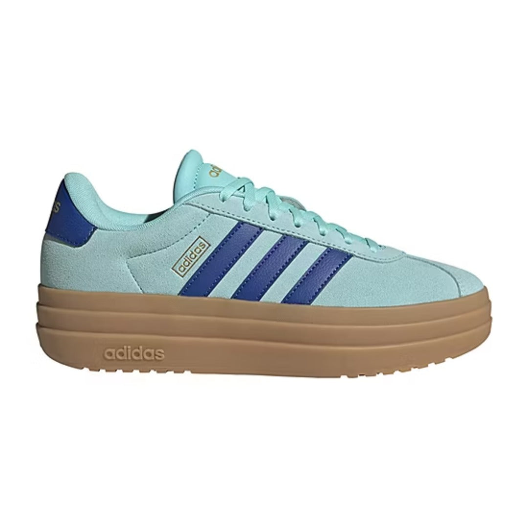 Light blue Adidas sneaker with brown sole on a white background