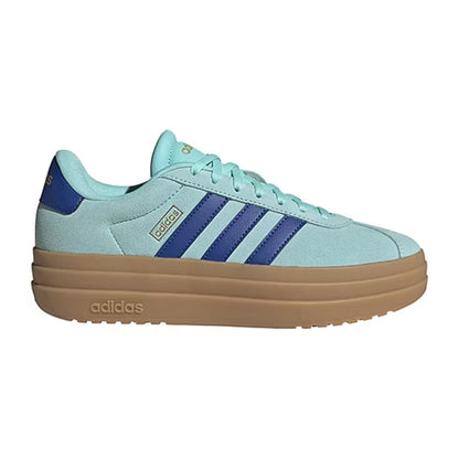 Light blue Adidas sneaker with brown sole on a white background