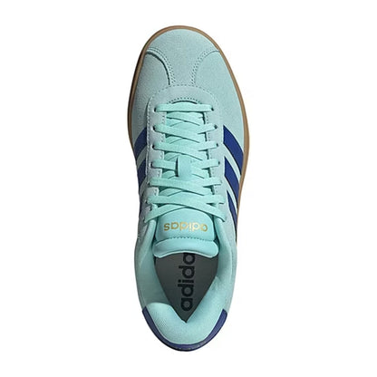 Light blue Adidas sneaker with brown accents on a white background