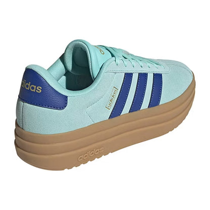 Light blue Adidas sneaker with brown sole on a white background