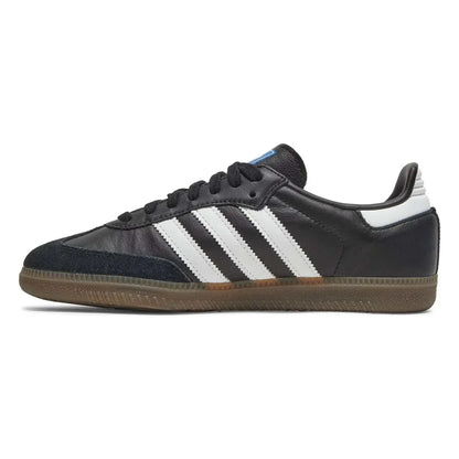 Black Adidas sneaker with white stripes on a white background
