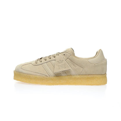 Beige sneaker with a white sole on a white background