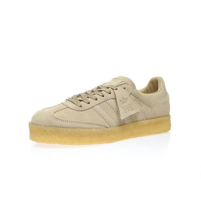 Beige sneaker with a white background