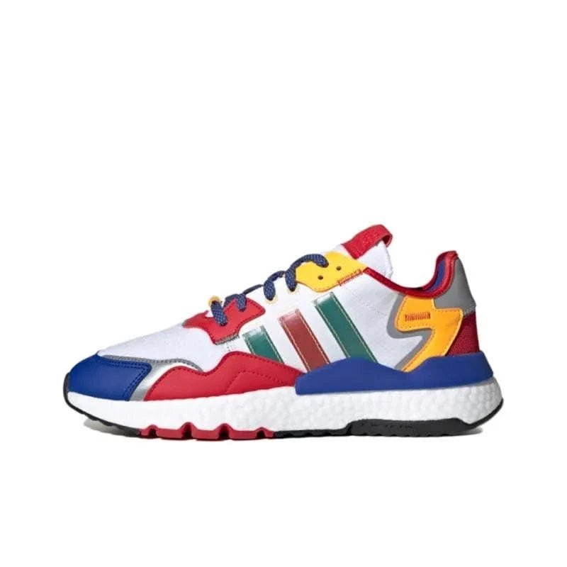 Multicolored sneaker with red, blue, yellow, and green accents on a white background