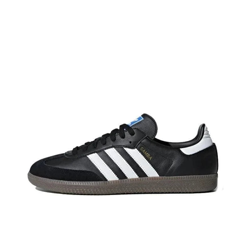 Black Adidas sneaker with white stripes on a white background