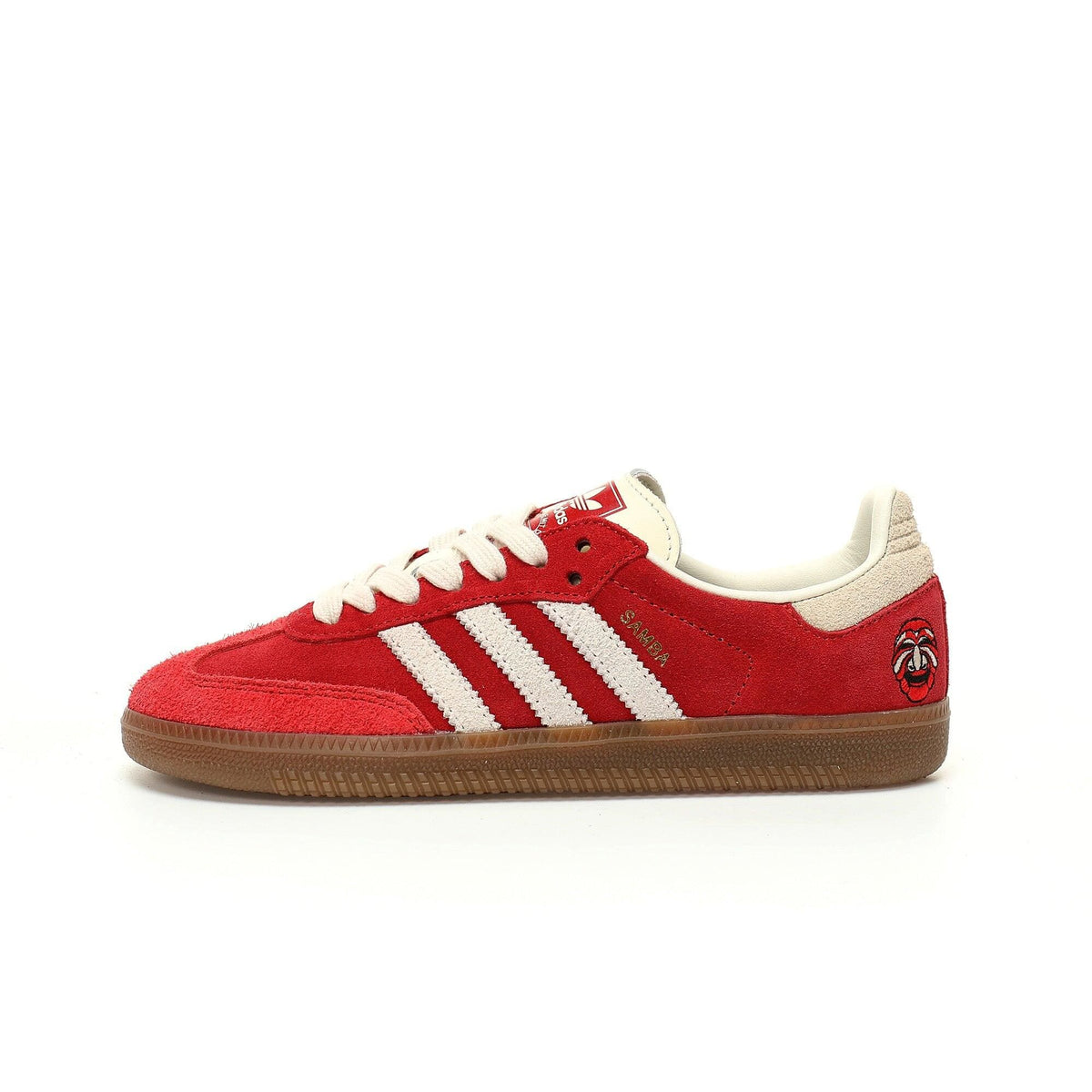 Red sneaker with white stripes on a white background