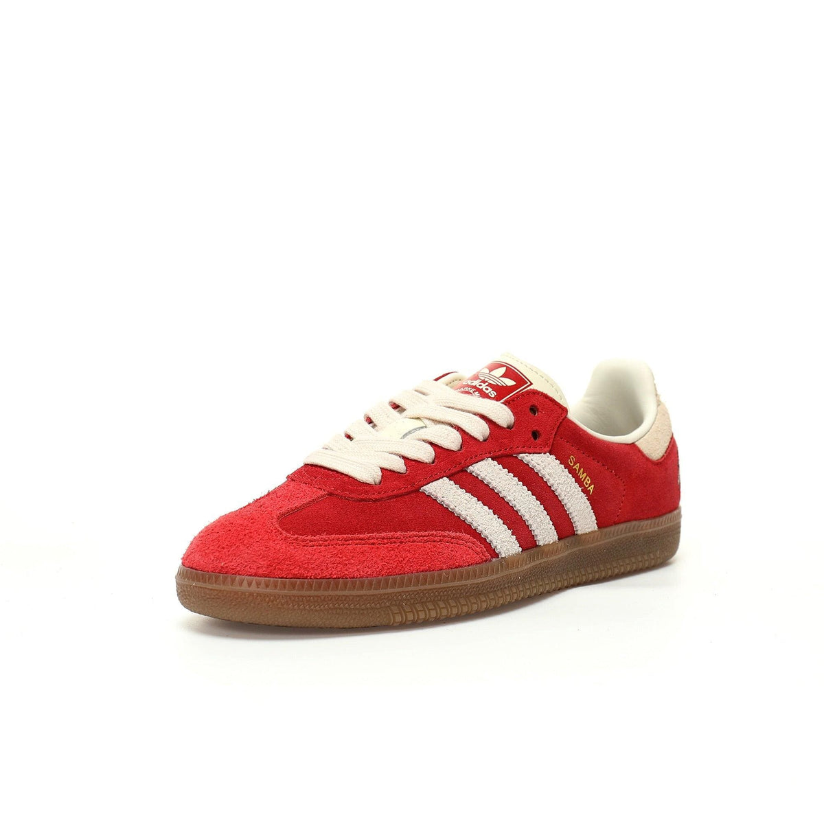 Red sneaker with white stripes on a white background