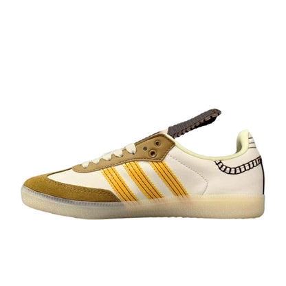 Sneaker with yellow stripes on a white background