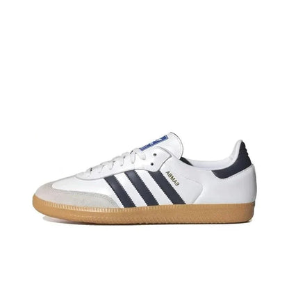 White sneaker with blue stripes and gum sole on a white background