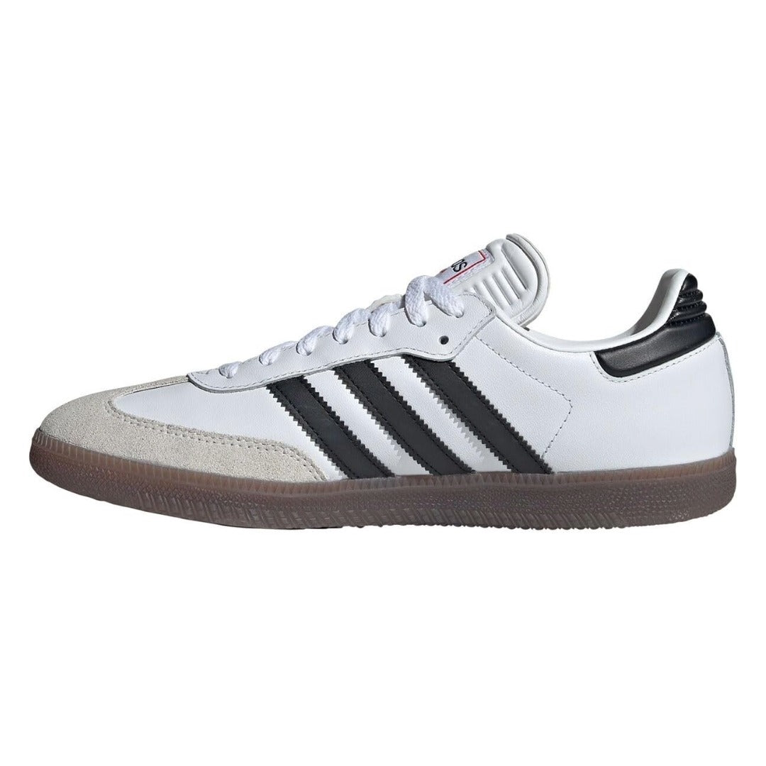 White sneaker with black stripes on a white background